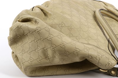 Lot 136 - Gucci Ivory Guccissima Monogram D Ring Hobo