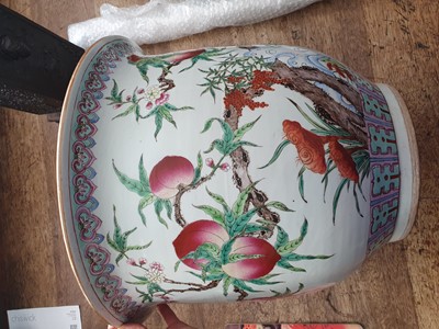 Lot 436 - A LARGE CHINESE FAMILLE ROSE 'PEACHES' JARDINIERE AND STAND.