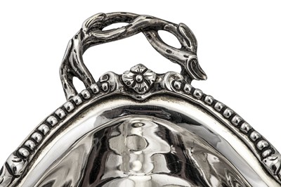 Lot 373 - A pair of George III sterling silver open sauce tureens, London 1770 by William Holmes (active from c. 1762)