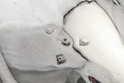 Lot 373 - A pair of George III sterling silver open sauce tureens, London 1770 by William Holmes (active from c. 1762)