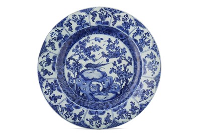 Lot 361 - A CHINESE BLUE AND WHITE 'PHEASANTS' CHARGER.