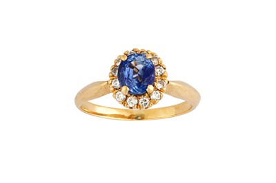 Lot 216 - A sapphire and diamond ring