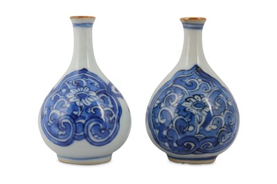 Lot 3 - TWO CHINESE BLUE AND WHITE BOTTLE VASES.
