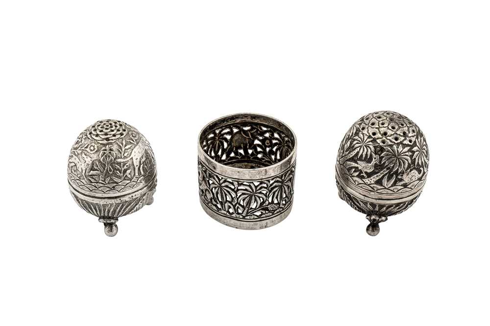 Lot 129 - Two early 20th century Anglo – Indian Raj unmarked silver pepper pots, Lucknow circa 1910