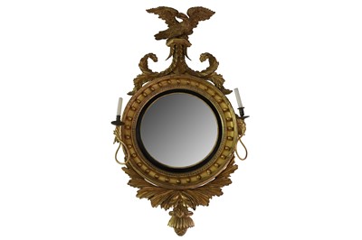 Lot 415 - A Regency convex gilt wall mirror