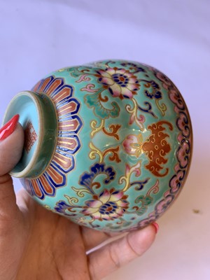 Lot 300 - A CHINESE FAMILLE ROSE TURQUOISE-GROUND BOWL.