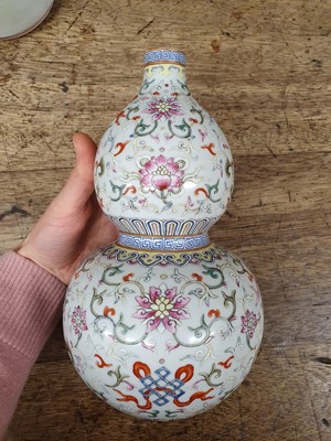 Lot 567 - A CHINESE FAMILLE ROSE DOUBLE GOURD 'BAJIXIANG' VASE.