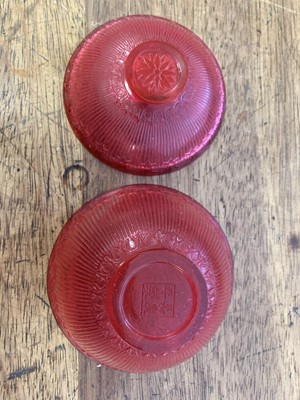Lot 20 - A CHINESE PEKING GLASS RUBY RED TEA BOWL AND COVER.