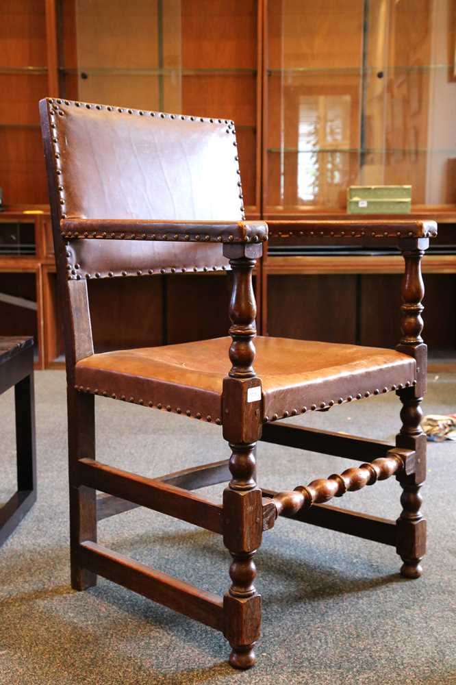 Lot 528 - A small oak refectory table, with four leather...