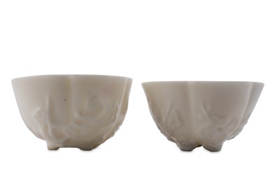 Lot 35 - A PAIR OF CHINESE BLANC-DE-CHINE 'PRUNUS BLOSSOM' CUPS.