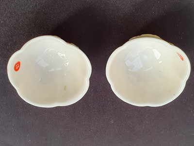 Lot 35 - A PAIR OF CHINESE BLANC-DE-CHINE 'PRUNUS BLOSSOM' CUPS.