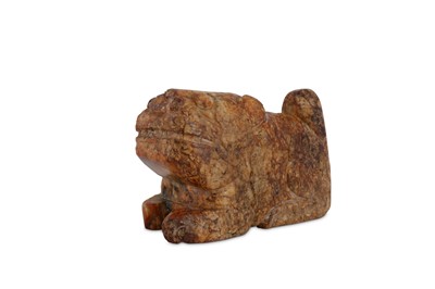 Lot 654 - A CHINESE RUSSET JADE CARVING OF A TIGER.