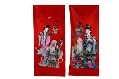 Lot 145 - A PAIR OF CHINESE RED-GROUND 'IMMORTALS' SILK PANELS.