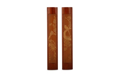 Lot 687 - A PAIR OF CHINESE SKIN-CARVED BAMBOO SCROLL WEIGHTS.
