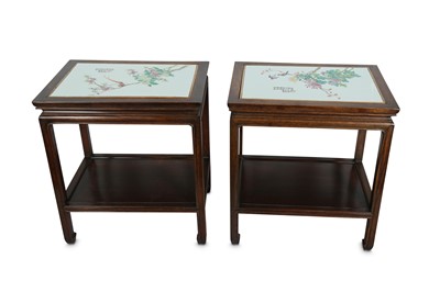 Lot 897 - A PAIR OF CHINESE WOOD STANDS WITH FAMILLE ROSE TOPS.