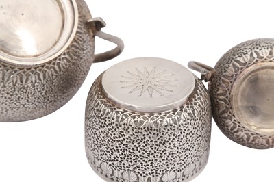 Lot 169 - A late 19th century Anglo – Indian unmarked silver three-piece tea service, Lucknow circa 1890