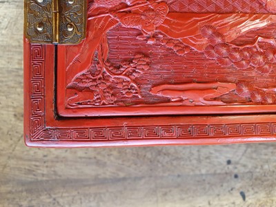 Lot 26 - A PAIR OF MINIATURE CHINESE CINNABAR LACQUER CABINETS.