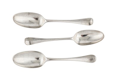 Lot 256 - A pair of early George II sterling silver tablespoons, London 1728 by Joseph Smith I (this mark reg. 3rd May 1728)