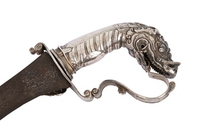 Lot 422 - A SOUTHEAST ASIAN SILVER YALI-HILTED SWORD