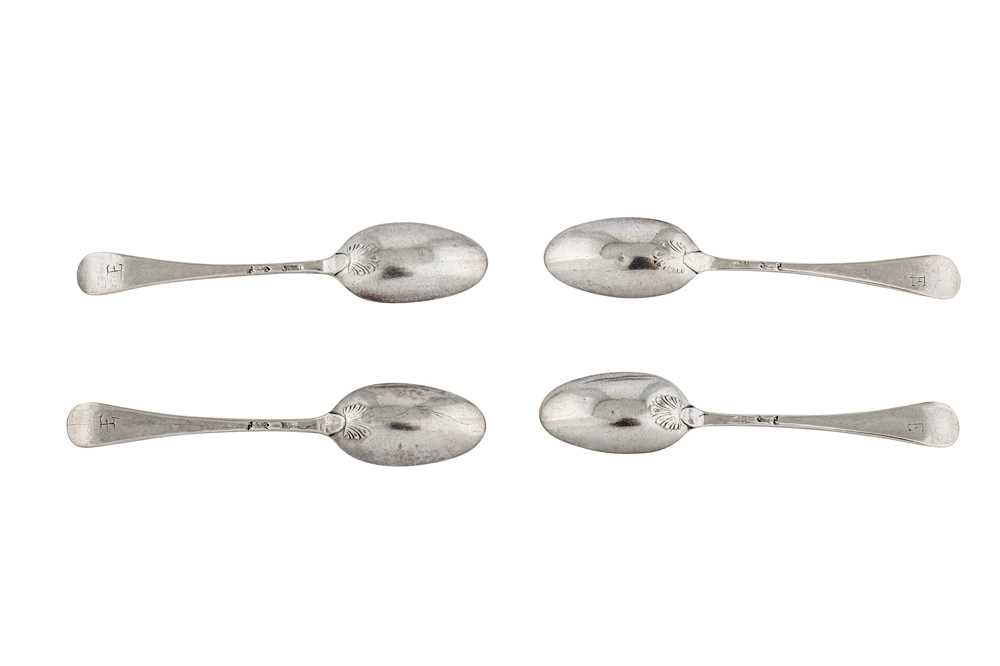 Lot 839 - A SET OF FOUR GEORGE II STERLING SILVER SHELL BACK TEASPOONS, LONDON CIRCA 1755 BY RICHARD HAWKINS (ACTIVE APPROXIMATELY 1751 - 1765)
