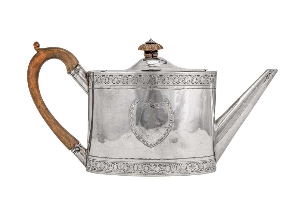 Lot 311 - A George III sterling silver teapot, London 1792 by John Robins (reg. 20th Oct 1774)