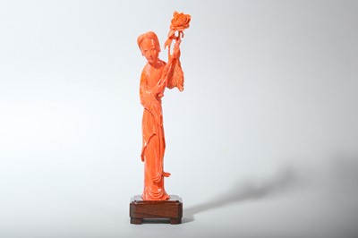 Lot 22 - A CHINESE CORAL 'LADY' CARVING.
