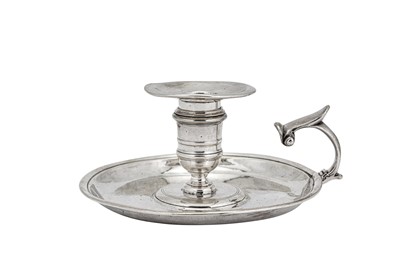 Lot 455 - A George II silver 'duty dodger' chamber stick, London circa 1730 by George Boothby (reg. 4th Aug 1720)