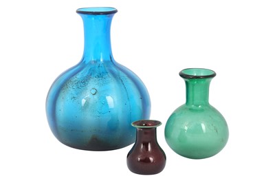 Lot 279 - THREE CLEAR COLOURED BLOWN MUGHAL GLASS BOTTLES