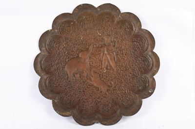 Lot 202 - A LOBED REPOUSSÉ INDIAN BRASS TRAY