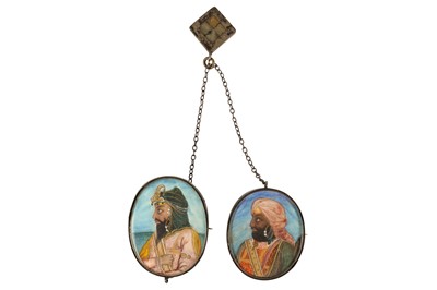 Lot 355 - λ A PAIR OF IVORY PORTRAIT MINIATURES OF MAHARAJA RANJIT SINGH'S SONS, KHARAK AND SHER