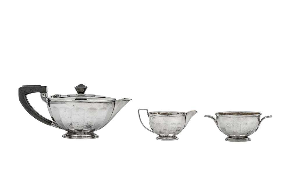 Lot 324 - A George V Art Deco sterling silver three-piece tea service, Birmingham 1934 by Goldsmiths and Silversmiths