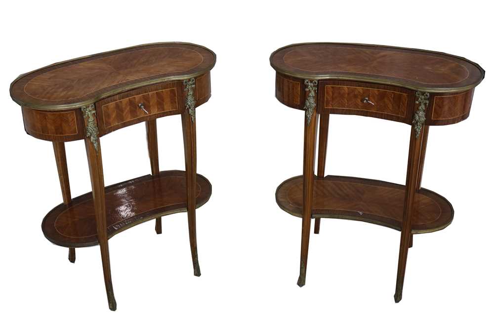 Lot 464 - A pair of mid 20th century French Louis XV style kingwood kidney shaped side tables