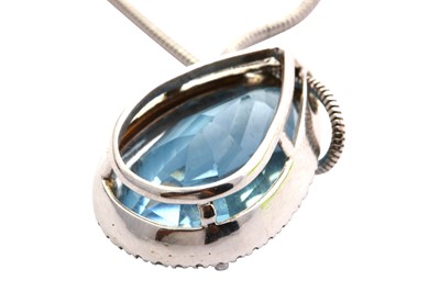 Lot 3 - A topaz and diamond pendant
