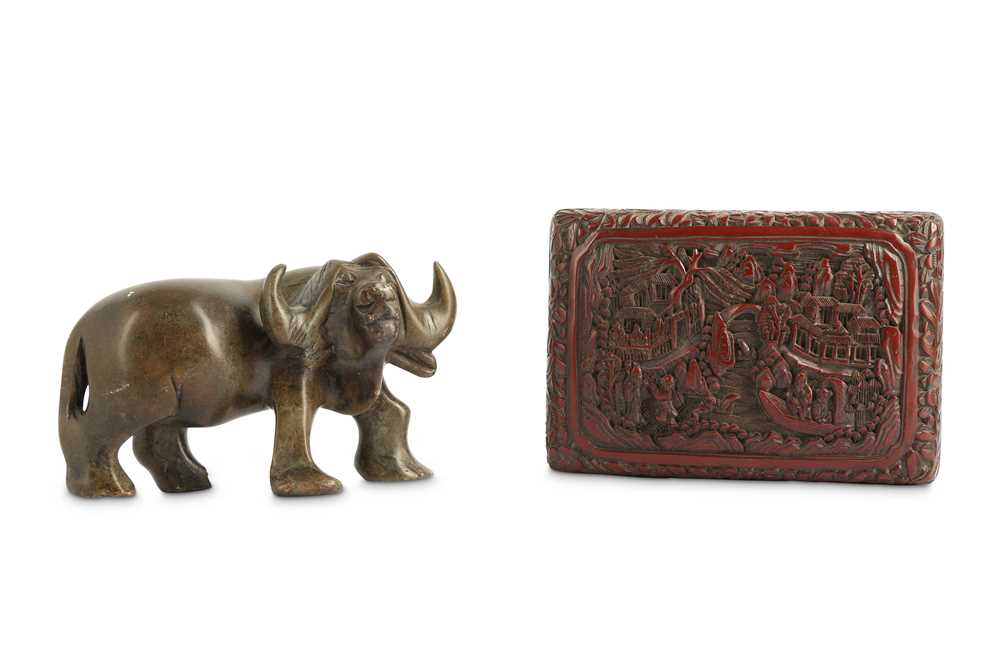 Lot 834 - A CHINESE CINNABAR LACQUER BOX AND COVER AND A SOAPSTONE BUFFALO CARVING.