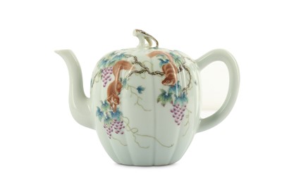Lot 902 - A CHINESE FAMILLE ROSE 'SQUIRRELS AND VINES' TEAPOT AND COVER.