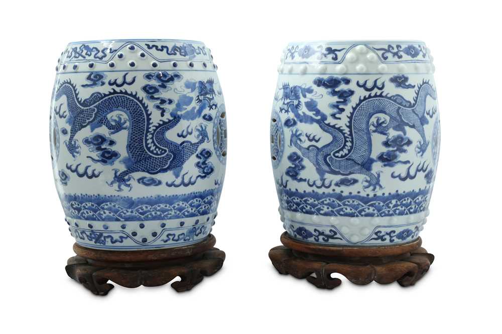 Lot 10 - A PAIR OF BLUE AND WHITE MINIATURE GARDEN SEATS.