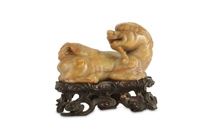 Lot 430 - A CHINESE SOAPSTONE CARVING OF BIXIE.