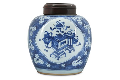 Lot 447 - A CHINESE BLUE AND WHITE PRUNUS JAR AND WOOD COVER.