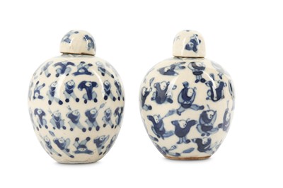 Lot 492 - A PAIR OF CHINESE BLUE AND WHITE 'BOYS' JARS AND COVERS.