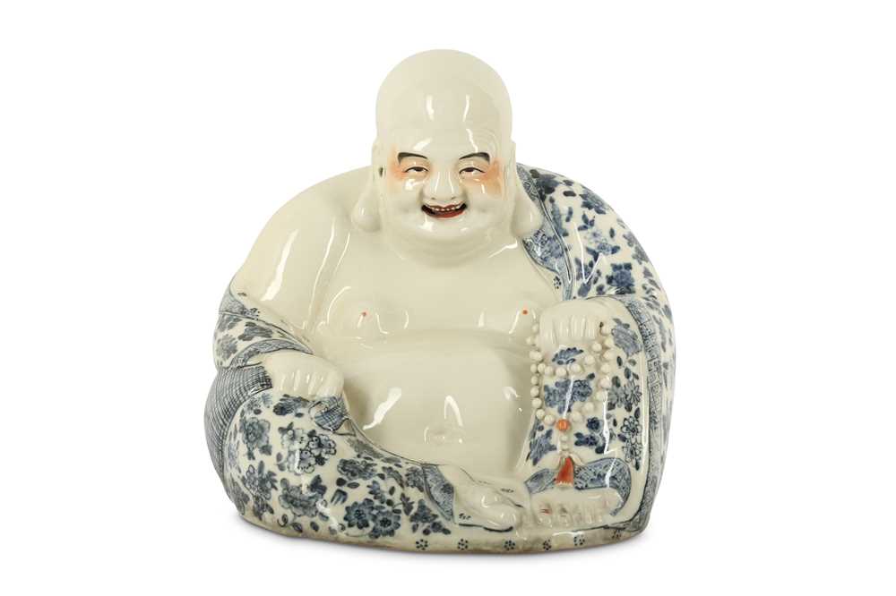 Lot 42 - A CHINESE PORCELAIN FIGURE OF BUDAI HESHANG.