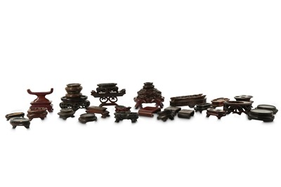 Lot 724 - A GROUP OF SMALL CHINESE WOOD STANDS.
