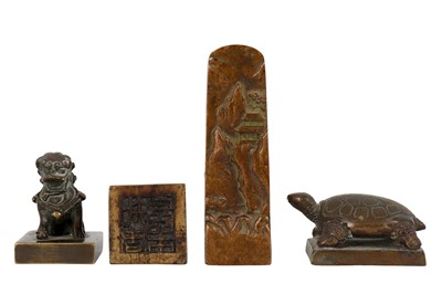 Lot 1014 - FOUR CHINESE BRONZE SEALS.