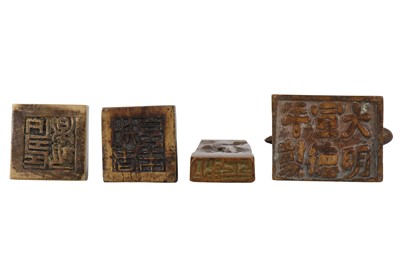 Lot 1014 - FOUR CHINESE BRONZE SEALS.