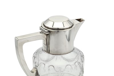 Lot 346 - A George V sterling silver mounted glass claret jug, London 1914 by Goldsmiths and Silversmiths