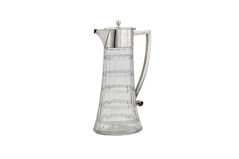 Lot 348 - A Victorian sterling silver mounted glass claret jug, London 1900 by William Hutton and Sons