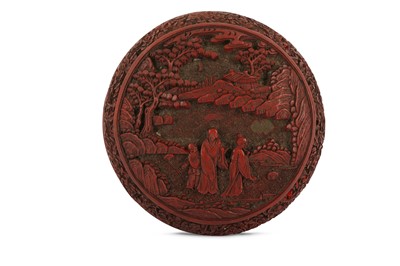 Lot 702 - A CHINESE CINNABAR LACQUER CIRCULAR BOX AND COVER.