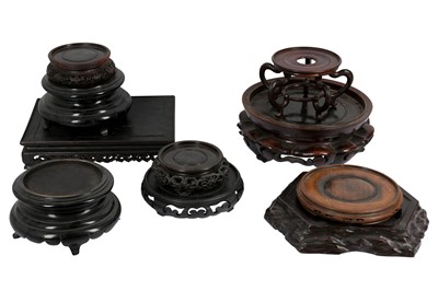 Lot 721 - TEN CHINESE WOOD STANDS.