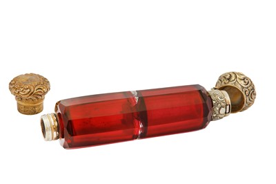 Lot 20 - A late 19th century French unmarked silver gilt double scent bottle, circa 1870