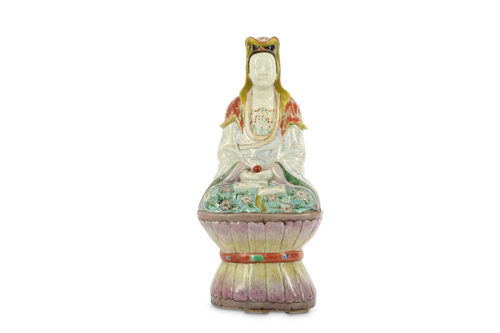 Lot 49 - A CHINESE FAMILLE ROSE FIGURE OF GUANYIN.