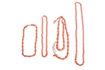 Lot 587 - FOUR CHINESE CORAL NECKLACES.